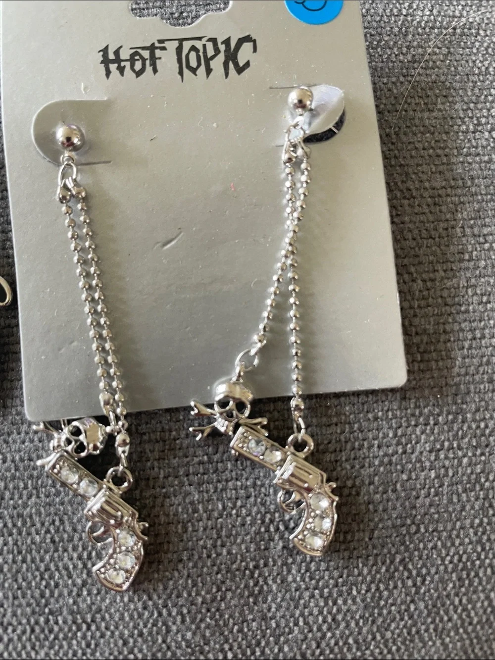 Hot Topic Silver Rhinestone Crossed Gun Pendant and Dangle Earring Set